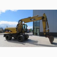 Колёсный экскаватор Caterpillar M316C 2003 года