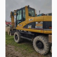 Колісний екскаватор Caterpillar M313 Свіжий 1854 мг